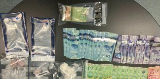 Illegal drugs and currency seized by Kawartha Lakes police after executing a search warrant at a Lindsay home on January 10, 2022. (Photo: Kawartha Lakes Police Service)