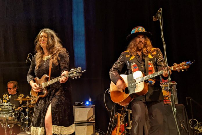 Juno-nominated singer-songwriter and guitarist Terra Lightfoot performing with Tom Wilson of Blackie and the Rodeo Kings at Peterborough's Market Hall on December 7, 2022. Originally from Hamilton, the roots-rocker is now living in Haliburton County and will peform for the first time in her new hometown on January 28, 2023. (Photo: Bruce Head / kawarthaNOW)