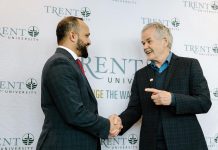 Edvoy founder and CEO Sadiq Basha and Trent University president Dr. Leo Groarke on February 15, 2023 at ICEF Dubai, where the two signed an agreement to launch the TEX Advanced Learning Centre at the university's Durham campus in Oshawa. (Photo: Edvoy)
