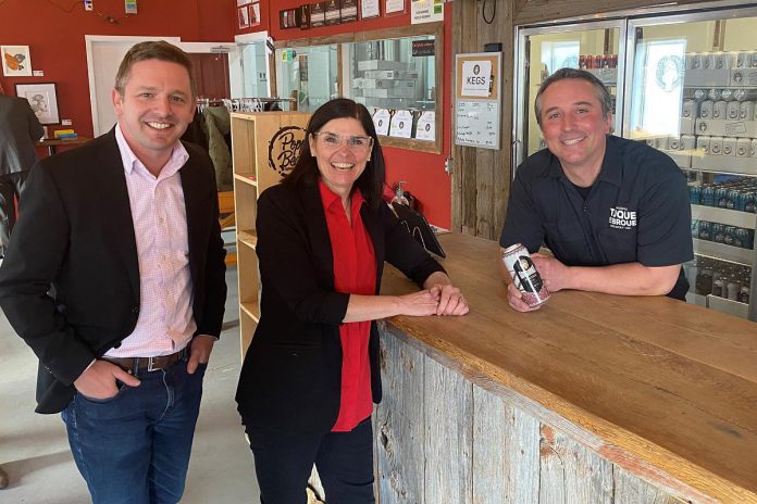 Filomena Tassi, the minister responsible for the Federal Economic Development Agency for Southern Ontario (FedDev Ontario) with Glengarry-Prescott-Russell MP Francis Drouin (left) and Brasserie Tuque de Broue Brewery Inc. owner Nicolas Malboeuf (right) on February 13, 2023 in Embrum, where Tassi announced nearly $40 million over the next three years for Community Futures Development Corporations in southern Ontario. (Photo: FedDev Ontario)