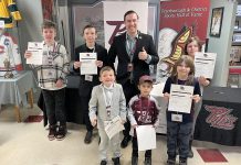 Deacon, Talon, Damien, Blake, Alexis, and Carter assumed roles as General Manager, Coach, Assistant Coach, PA Announcer, In-Game Host, and Radio Broadcaster at the Peterborough Petes game on Family Day (February 20, 2023), as part of the Petes' Next-Gen program that lets kids shadow the real people in these roles. The six kids are all clients (or siblings of clients) of Five Counties Children's Centre. Despite Five Counties on track to serve its highest-ever number of clients in a single year, nearly 2,000 area children are waiting for care up to two years. (Photo courtesy of Five Counties Children's Centre)