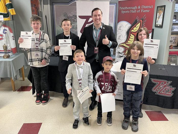 Deacon, Talon, Damien, Blake, Alexis, and Carter assumed roles as General Manager, Coach, Assistant Coach, PA Announcer, In-Game Host, and Radio Broadcaster at the Peterborough Petes game on Family Day (February 20, 2023), as part of the Petes' Next-Gen program that lets kids shadow the real people in these roles. The six kids are all clients (or siblings of clients) of Five Counties Children's Centre. Despite Five Counties on track to serve its highest-ever number of clients in a single year, nearly 2,000 area children are waiting for care up to two years. (Photo courtesy of Five Counties Children's Centre)