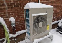 Many homeowners are switching to cold-climate air-source heat pumps, shown here, to save money and to keep their home warm during the winter while remaining climate-conscious. (Photo: Clara Blakelock / GreenUP)
