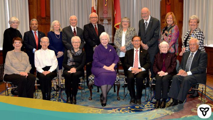 Peterborough resident Susan Leask (back row, third from left) was one of 16 recipients of the 2022 Ontario Senior Achievement Awards, presented by Lieutenant Governor Elizabeth Dowdeswell and Ontario Minister for Seniors and Accessibility Raymond Cho (front row, fourth and third from right) at Queen's Park in Toronto on January 31, 2023. (Photo: Ontario Ministry for Seniors and Accessibility)