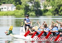 A dragon boat team races at Peterborough's Dragon Boat Festival in 2015. Since 2001, the annual festival has raised more than $3.9 million for cancer care at Peterborough Regional Health Centre. (Photo: Linda McIlwain / kawarthaNOW)