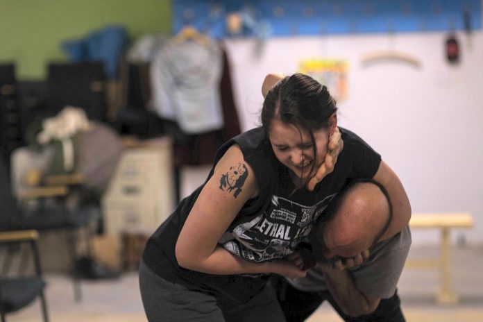 Sam Weatherdon has Brad Brackenridge in a headlock during a rehearsal for "Ring Rats", which tells the story of a broken-down former professional wrestler hired to train a young woman. Written and directed Derek Weatherdon, the fourth original play from Planet 12 Productions runs at The Theatre On King in downtown Peterborough from February 22 to 25, 2023. (Photo: Adam Martignetti)