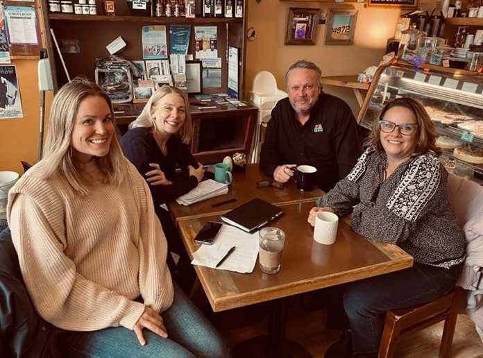 "Team Ptbo" at a morning coffee meeting at Black Honey in downtown Peterborough: Community Futures Peterborough's new executive director Devon Girard (left), Peterborough and the Kawarthas Chamber of Commerce President and CEO Sarah Budd (second from left), Peterborough Downtown Business Improvement Area executive director Terry Guiel, and Peterborough & the Kawarthas Economic Development president and CEO Rhonda Keenan. (Photo courtesy of Terry Guiel)