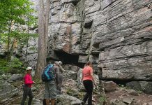 Hikers at the base of the James Cooper Lookout Trail in Haliburton Highlands during the annual Hike Haliburton Festival, one of four festivals in the greater Kawarthas region among the list of the top 100 festivals and events in Ontario by Festivals and Events Ontario. (Photo: Hike Haliburton Festival / My Haliburton Highlands)