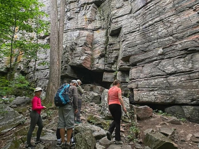 Hikers at the base of the James Cooper Lookout Trail in Haliburton Highlands during the annual Hike Haliburton Festival, one of four festivals in the greater Kawarthas region among the list of the top 100 festivals and events in Ontario by Festivals and Events Ontario. (Photo: Hike Haliburton Festival / My Haliburton Highlands)