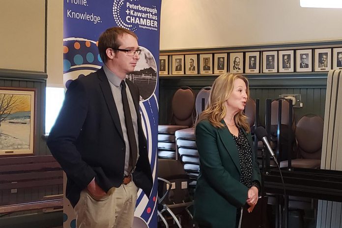 Ontario NDP leader Marit Stiles speaks at a media event at the Peterborough and the Kawarthas Chamber of Commerce office in downtown Peterborough on March 14, 2023 while Joel Wiebe, the Chamber's vice president of government relations and communications, looks on. (Photo: Jeannine Taylor / kawarthaNOW)