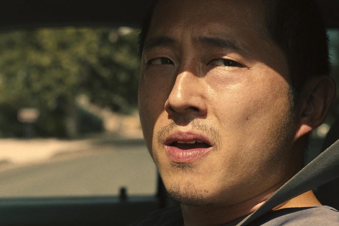 The Walking Dead's Steven Yeun stars with Ali Wong in the new Netflix dramedy series "Beef", which follows two strangers who descend into an escalating vendetta after a road rage incident. It premieres on Netflix on Thursday, April 6th. (Photo: Netflix)