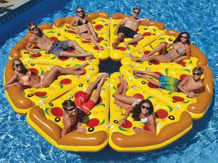 Cottagers can contact 'Pie In The Sky - Dockside Pizza Delivery' if they want their lake to be considered for the service. Everyone who calls will be entered in a promotional contest to win an eight-slice "pizza floatie". (Photo: Swimline)