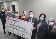 Representatives from Scotiabank joined Peterborough Regional Health Centre (PRHC) Foundation president and CEO Lesley Heighway (second from right) on March 9, 2023 for the dedication of the hospital's new youth eating disorders day treatment program and clinic space, named after Scotiabank in recognition of a $250,000 pledge to fund the essential treatment area for the program. Also pictured from left to right are Scotiabank's senior manager of regional marketing Sunny Sekhon, small business development manager Nolan Frazer, Portage Place branch manager Larry Toupin, Summit Plaza branch manager Charlyne MacDonald, senior vice president Lesly Tayles, district vice president Chris Skinner, and regional director of wealth partnerships Michelle Power. (Photo courtesy of PRHC Foundation)