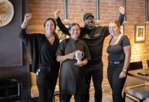 Chef Jennifer Guiterrez of Agave by Imperial holds the Top Hot Chocolatier trophy the Mexican restaurant in downtown Peterborough received as the champions of the inaugural Ptbo Hot Chocolate Fest. Also pictured from left to right are restaurant server Cynthia Routledge, restaurant owner and operator Nitin Grover, and sever Madison Imrie. (Photo courtesy of Peterborough DBIA)