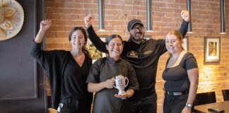 Chef Jennifer Guiterrez of Agave by Imperial holds the Top Hot Chocolatier trophy the Mexican restaurant in downtown Peterborough received as the champions of the inaugural Ptbo Hot Chocolate Fest. Also pictured from left to right are restaurant server Cynthia Routledge, restaurant owner and operator Nitin Grover, and sever Madison Imrie. (Photo courtesy of Peterborough DBIA)