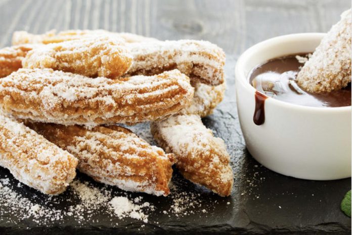 Agave by Imperial's 'Hot Churro-late' is a thick and creamy authentic Mexican hot chocolate made with cocoa and dark chocolate and served with two cinnamon and sugar-topped churros for dipping.  (Photo courtesy of Ptbo Hot Chocolate Fest)