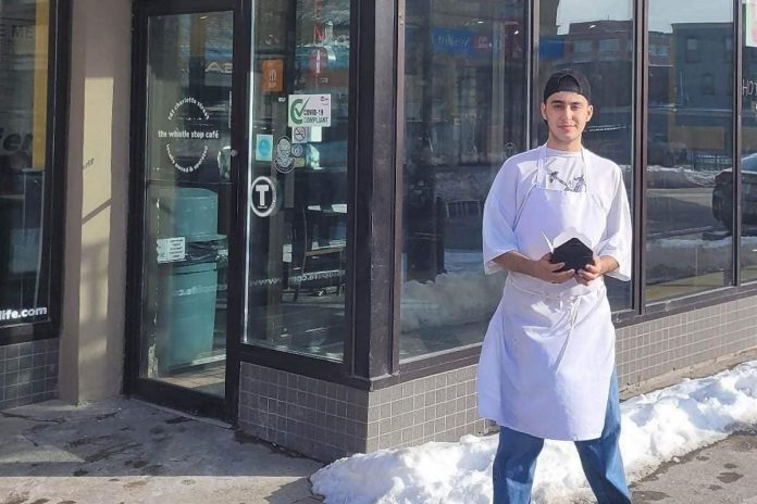 19-year-old Syrian refugee Rashid Sheikh Hassan, pictured outside The Whistle Stop Café in downtown Peterborough where he works, has launched a GoFundMe campaign to raise funds for the Canadian International Medical Relief Organization (CIMRO) to purchase medicine and medical supplies for survivors of the February 6, 2023 earthquake that devastated southern Turkey and northern Syria. The Whistle Stop Café will also be donating all proceeds from poutine sales on March 13, 2023 to CIMRO. (Photo courtesy of Dave McNab)