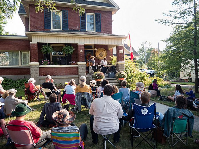 Mayhemingways (Benj Rowland and Josh Fewings) perform at Porchapalooza during Artsweek Peterborough 2018. Featuring live music performed by local musicians on five neighbourhood porches, Porchapalooza returns on May 6 and 7 during Artsweek 2023, which runs from May 5 to 14 with 10 days of free performance, poetry, and visual arts projects across Peterborough featuring 40 events and nearly 100 artists. (Photo: Andy Carroll)