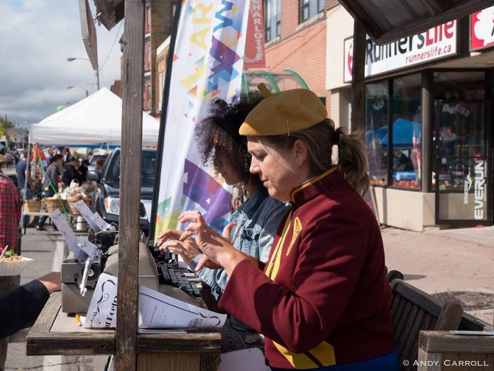 Pictured during Artsweek Peterborough 2018, the Take-Out Poetry Cart returns for Artsweek 2023.  Step up to the handmade bicycle-pulled cart and a local poet will create a poem just for you, tapping it out on a classic manual typewriter. (Photo: Andy Carroll)