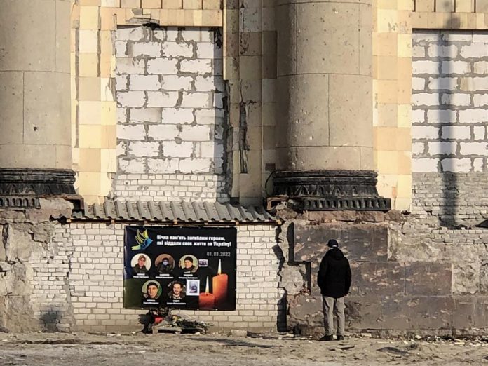 During her time in Ukraine, Peterborough native Chloë Black has witnessed the physical and human devastation from Russia's invasion of the country, including this father who walks an hour every day to this bombed building where his son lost his life. As part of the Blues for Ukraine benefit concert on April 30, 2023, Chloë will give a video presentation detailing her trips and the important relief work she has been involved with.  (Photo courtesy of Chloë Black)
