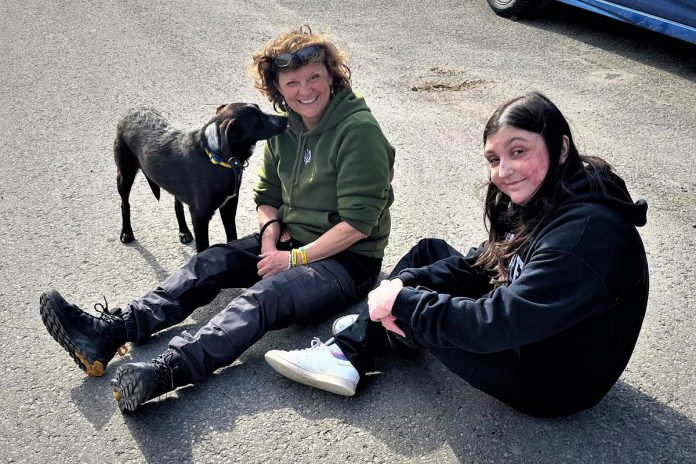 Chloë Black (left) back home in Peterborough when her niece Lydia met Dottie, a rescue dog from Kramatorsk in Ukraine that Chloë brought to Canada after much effort. She first met Dottie in 2022 when she volunteered with a group building a shelter for 800 animals displaced by the Russian invasion of Ukraine. (Photo courtesy of Chloë Black)