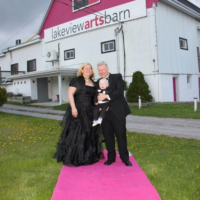 Globus Theatre founders Sarah Quick and James Barrett with their son Cue on the red carpet at the Lakeview Arts Barn during the 2013 Starlight Ball celebrating Globus Theatre's 10th anniversary. The 20th anniversary Starlight Ball, taking place on April 22, 2023, will raise funds for the theatre company's $2-million capital campaign to purchase the Lakeview Arts Barn. (Photo: Globus Theatre