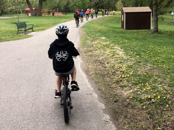 Peterborough has lots of great opportunities for cycling, including the Trans Canada Trail that runs through the heart of Peterborough and boasts many destinations (like Roger's Cove pictured here) that are perfect for a picnic to celebrate the spring blooms. Cycling can reduce stress and anxiety, boost your mood, increase time with your loved ones, and reduce greenhouse gases that would have been emitted through driving a vehicle. (Photo: GreenUP)