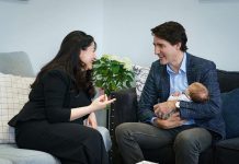 Former Peterborough-Kawartha MP Maryam Monsef chats with Prime Minister Justin Trudeau as he holds her infant son Samad during a visit with Monsef and her husband, former Fredericton Liberal MP Matt DeCourcey, in Peterborough this week. (Photo: Justin Trudeau / Instagram)