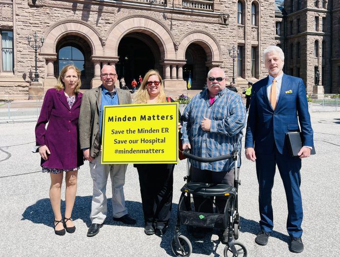 Minden residents Patrick Porzuczek, Laura Porzuczek, and Richard Bradley (middle) with NDP health critic France Gélinas (left) and NDP MPP Spadina-Fort York Chris Glover (right) in front of the Legislature at Queen's Park in Toronto on April 27, 2023, where they delivered a petition requesting a moratorium of the decision to close the Minden emergency department on June 1. (Photo via France Gélinas / Facebook)
