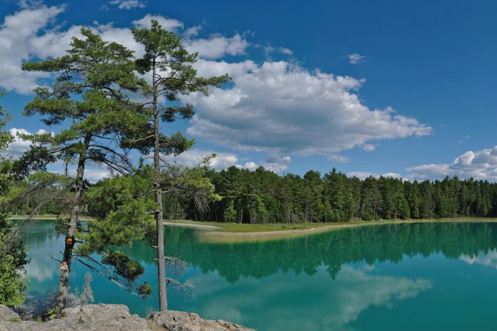 McGinnis Lake at Petroglyphs Provincial Park is one of only a handful of meromictic lakes in Canada. A meromictic lake has layers of water that do not intermix, creating a unique and fragile ecosystem. (Photo: Wikipedia)