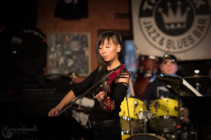 Award-winning electric violinist Victoria Yeh, who recently moved from Toronto to Peterborough, will be performing with Paul DeLong's ONE WORD at the Gordon Best Theatre in downtown Peterborough on May 4, 2023. (Photo: Trevor Hesselink / Groundswell Photography)