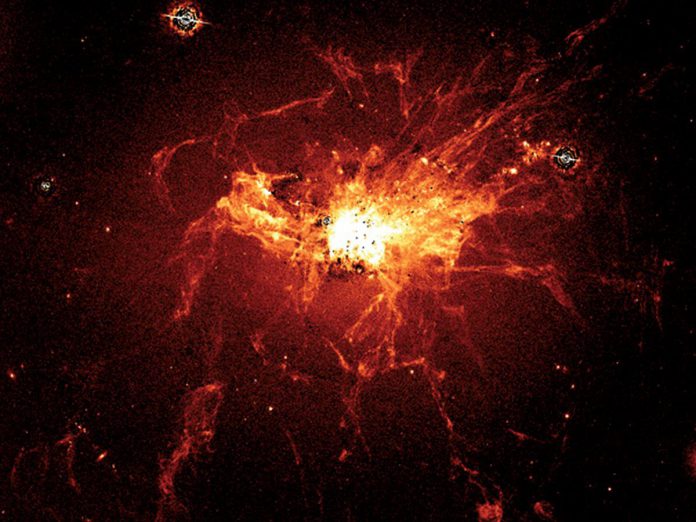 Charlie Glasspool's 3C84 project was inspired by the NGC 1275 galaxy, located 237 million light-years from Earth, which contains one of the brightest radio sources in the sky. This image of NGC 1275, taken in 2006 using the NASA/ESA Hubble Space Telescope's Advanced Camera for Surveys, shows the fine thread-like filaments in the 100-million-degree Fahrenheit hot gas surrounding the galaxy, which are markers of the feedback process through which energy is transferred from the galaxy's central massive black hole to the surrounding gas. (Image: NASA/ESA)