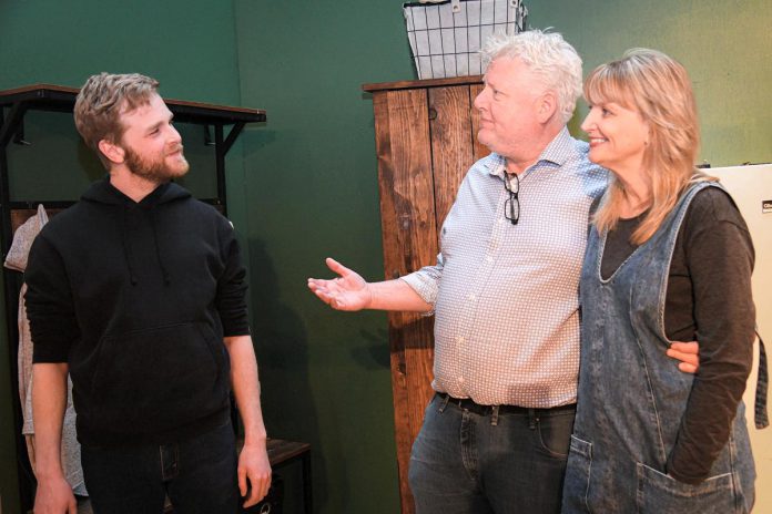 Ryan Sheedy as Drew Sullivan, James Barrett as his father Harry, and Anna Silvija Broks as Harry's neighbour Gin in a rehearsal for Norm Foster's poignant comedy "Mending Fences", which runs for 11 performances from May 10 to 20, 2023 at the Lakeview Arts Barn in Bobcaygeon. (Photo: Rebecca Anne Bloom, R. A. Bloom Creations and Photography)