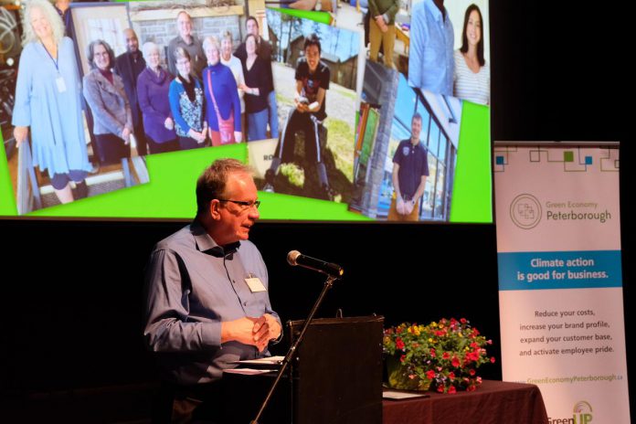 Peterborough Mayor Jeff Leal speaks to members of Green Economy Peterborough and guests at the second annual Leadership in Sustainability Awards event on May 4, 2023 at Market Hall Performing Arts Centre in downtown Peterborough to recognize local businesses for their contribution towards a greener community. Award winners included Lake Edge Cottages, Peterborough Golf & Country Club, Wild Rock Outfitters, Jigsaw Organizing Solutions, Green Street, and Charlotte Products, with a special recognition of Woodleigh Farms. (Photo: Lili Paradi / GreenUP