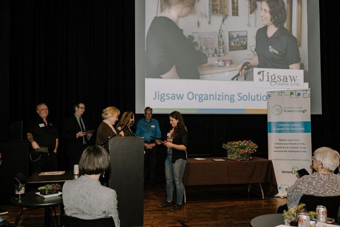 Jigsaw Organizing Solutions receives their "Leading Through Connection" award at the second annual Leadership in Sustainability Awards event on May 4, 2023 at Market Hall Performing Arts Centre in downtown Peterborough. (Photo: Heather Doughty Photography)