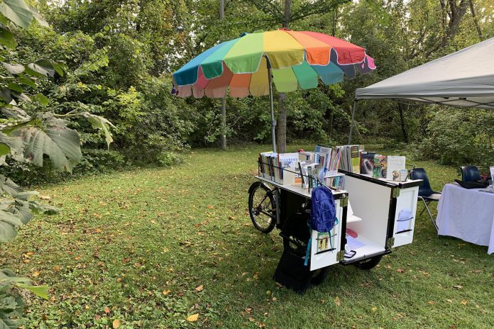 As well as encouraging literacy by providing mobile library services, the Peterborough Public Library's Book Bike is an environmentally friendly alternative to traditional gas-powered bookmobiles. (Photo: Mark Stewart / Peterborough Public Library)