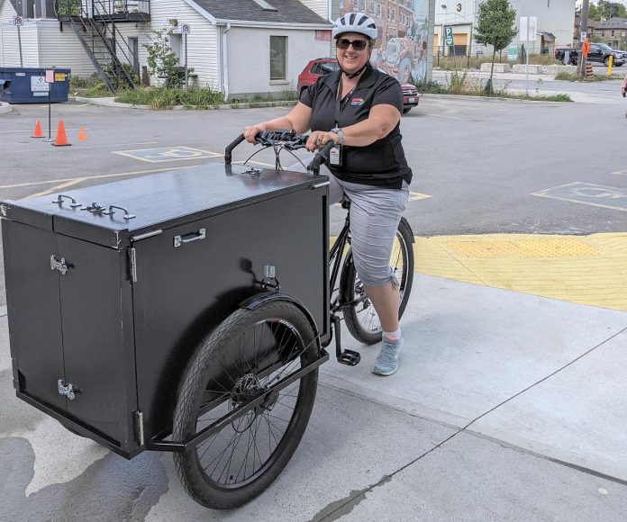 The Peterborough Public Library is working towards weaving sustainability into everything they do, and this pedal-powered mobile little library is just one example.  (Photo: Mark Stewart / Peterborough Public Library)