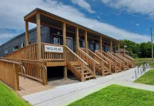 The Region of Durham's 2021 micro-housing pilot project in central Oshawa features two pods of five-unit prefabricated housing suites intended for temporary transitional housing with supports from local agencies. The building was designed to be relocatable. (Photo: NRB Modular Solutions Inc.)