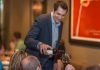 Louis Karkabasis, owner and sommelier of Pane Vino Trattoria & Wine Bar in Lindsay, serves a customer at the popular Italian restaurant, which will be closing after May 27, 2023. (Photo via Pane Vito website)