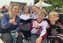 Making sure all knew who number one in their hearts is were these young Peterborough Petes fans, brought by Ashley Woollacott from Ennismore to Quaker Foods City Square in downtown Peterborough for the community watch party held May 19, 2023. Despite the Petes ultimately falling to the London Knights 4-1, forcing a sixth game on Sunday, fans young and old alike enjoyed the outdoor experience. (Photo: Paul Rellinger / kawarthaNOW)