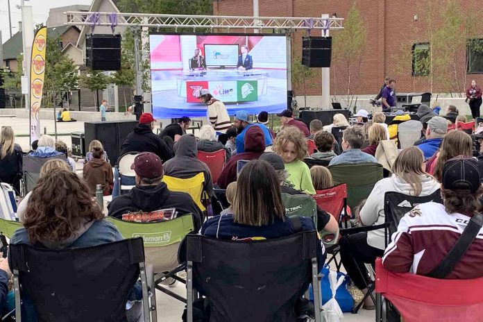 Around 400 people gathered during a community watch party at Quaker Foods City Square in downtown Peterborough on May 19, 2023 to take in game five of the best-of-seven Ontario Hockey League championship final between the hometown Peterborough Petes and the London Knights, livestreamed from Budweiser Gardens in London. Additional community watch parties will take place at the square on May 27 and 28, 2023 so fans can cheer on the OHL champion Peterborough Petes from afar as they take on the Western Hockey League champion Seattle Thunderbirds and then the Kamloops Blazers at the Memorial Cup championship series in Kamloops, B.C. (Photo: Paul Rellinger / kawarthaNOW)