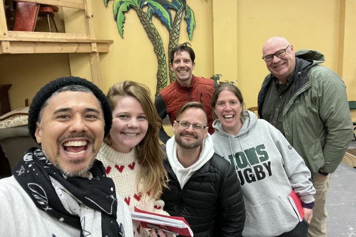 The Peterborough Theatre Guild's production of Norm Foster's comedy of manners "The Long Weekend", running for 10 performances from July 5 to 15, 2023, is directed by Jason Shulha (back left) with assistant director David Geene (back right) and stars (front left to right) Chelsey Mark as Roger Nash, Jennifer Hilborn as Abby Nash, David Adams as Max Trueman, and Siobhán MacQuarrie as Wynn Trueman. (Photo: Chelsey Mark)