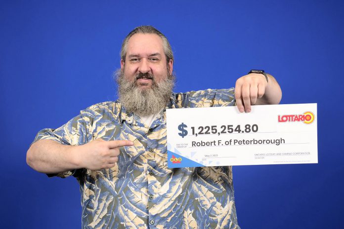 53-year-old Robert Farr of Peterborough with his $1,225,254.80 jackpot win from the January 21, 2023 Lottario draw. (Photo: OLG)