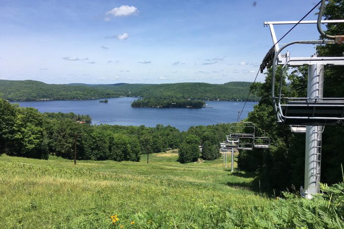 The chairlift at Sir Sam's Ski & Bike in the Haliburton Highlands gives stunning views of Eagle Lake. (Photo: Sir Sam's Ski & Bike)