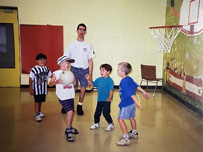 Adam White has a lifelong association with Five Counties Children's Centre. As a child, he received treatment at the centre and went on to become a youth volunteer supporting some of the same recreational programs in which he took part. (Photo courtesy of Five Counties Children's Centre)