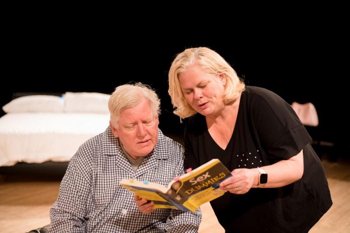 Globus Theatre co-founders James Barrett and Sarah Quick in a rehearsal for Michele Riml's hit comedy "Sexy Laundry", running for 14 performances from June 21 to July 8, 2023 at the Lakeview Arts Barn in Bobcaygeon. The real-life couple first performed as Henry and Alice in the theatre company's 2013 production of the play. (Photo: R.A. Bloom Creations and Photography)