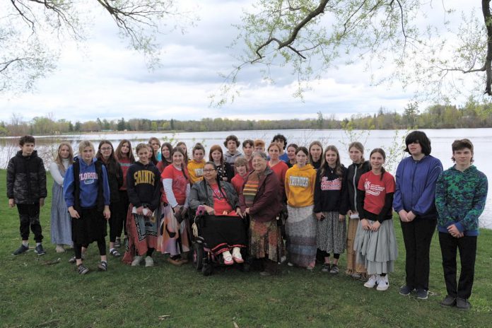 Elder Dorothy Taylor of Curve Lake First Nation shared teachings with students and staff from Immaculate Conception Catholic Elementary School at a water walk at Little Lake on May 5, 2023. (Photo: Lili Paradi, Sacred Water Circle / GreenUP)