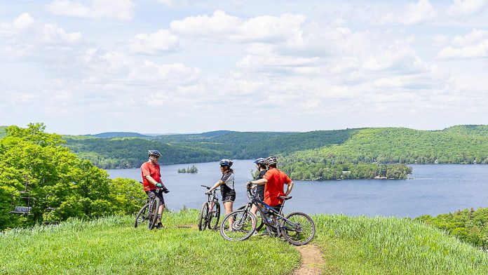 Abundant with lakes and nestled along rugged northern Ontario landscapes, the Haliburton Highlands is a popular destination for cyclists of all ages and abilities. It's easy to get started cycling in the Haliburton Highlands as nearly 40 curated cycling routes are available via Ride with GPS, a website and mobile app that helps people discover and plan cycling routes. (Photo courtesy of Haliburton Highlands Economic Development & Tourism)