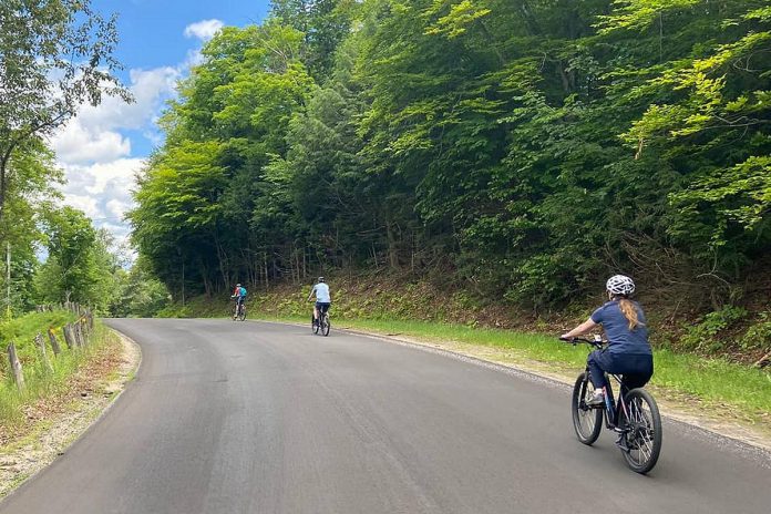 For casual or older riders exploring the Haliburton Highlands, e-bikes can be a good option as they make it easier to keep up with other riders and deal with hilly terrain. (Photo courtesy of Haliburton Highlands Economic Development & Tourism)