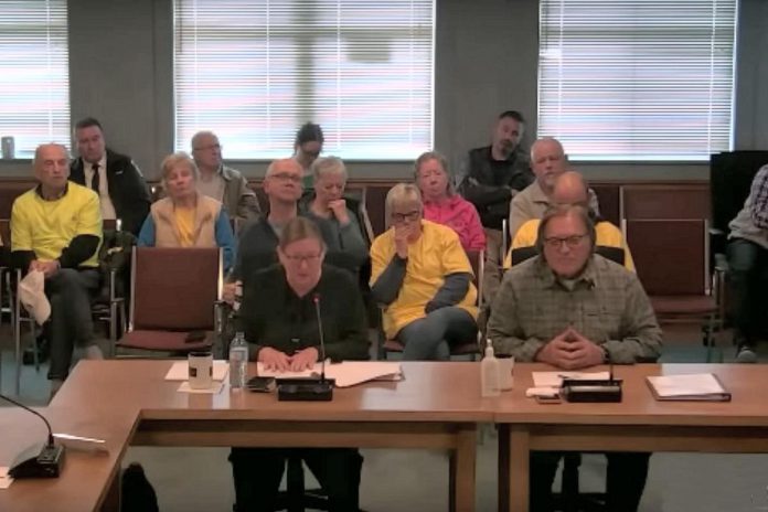 Haliburton Highlands Health Services president and CEO Carolyn Plummer and board chair David O'Brien appear before a special meeting of Haliburton County council on May 26, 2023 after releasing a plan to consolidate the Minden and Haliburton emergency departments. After that presentation, Minden Hills Township mayor Bob Carter called on the board to resign. (kawarthaNOW screenshot)